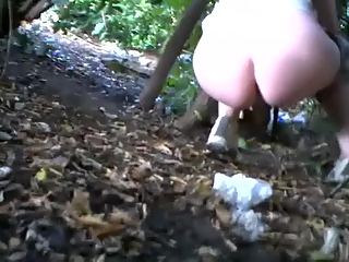 your voyeur videos - Woman caught beyond some bushes peeing