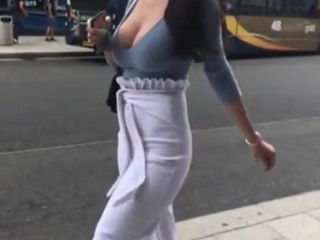 your voyeur videos - Big tits bouncing as she walks