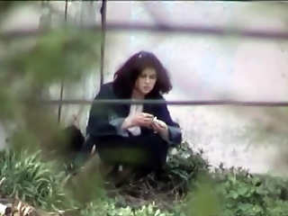 Piss – Woman pees next to big wall your voyeur videos - Woman pees next to big wall