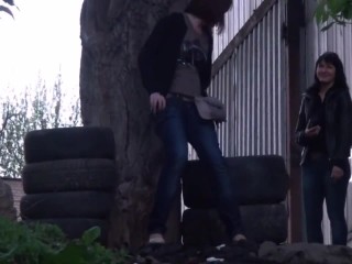 your voyeur videos - Two gals pissing next to tires