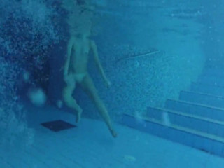 your voyeur videos - Nudist lady in nudist pool