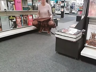 your voyeur videos - Flashing pussy in the book store