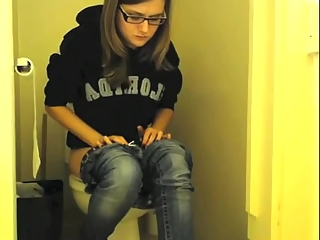 your voyeur videos - Girl in glasses pees in bathroom toilet