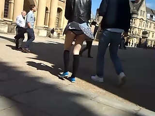 your voyeur videos - Wind lifts teen short skirt and exposes her ass