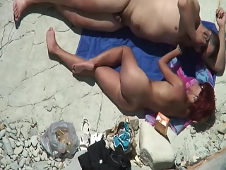 your voyeur videos - Fat nudist and his short redhead wife at beach