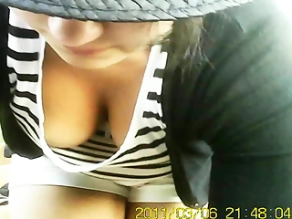 your voyeur videos - Girl in white and black stripes top cleavage