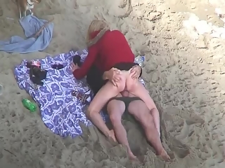 your voyeur videos - Clothed woman fucked in the beach