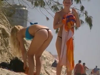 your voyeur videos - Topless girl in thong bikini