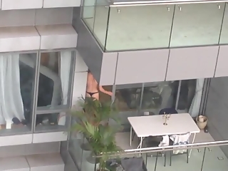 your voyeur videos - Neighbor spied topless in balcony