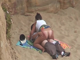 your voyeur videos - Chubby girl rides boyfriends cock in beach