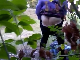 your voyeur videos - Chubby granny caught in the woods washing