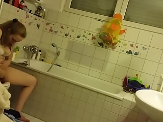 your voyeur videos - Chubby girl spied in bathroom peeing and washing pussy