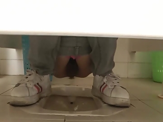 your voyeur videos - Asian woman in glasses spied in public toilet