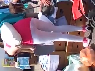 your voyeur videos - White leggings woman in flea market