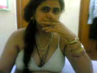 Indian - malika bhabhi in sexy white bra showing off