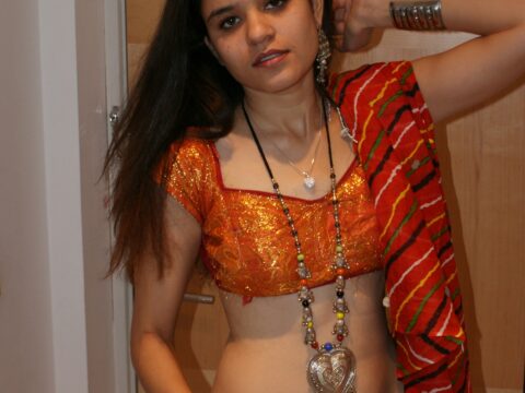 Indian - Jasime in traditional Indian ghagra cholie and dancing